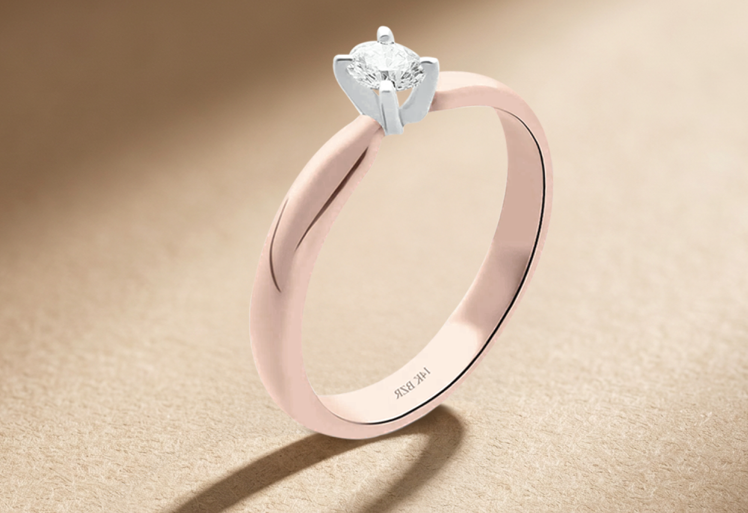 Anillo de Compromiso Oro Rosa con un Diamante de 25 Pts