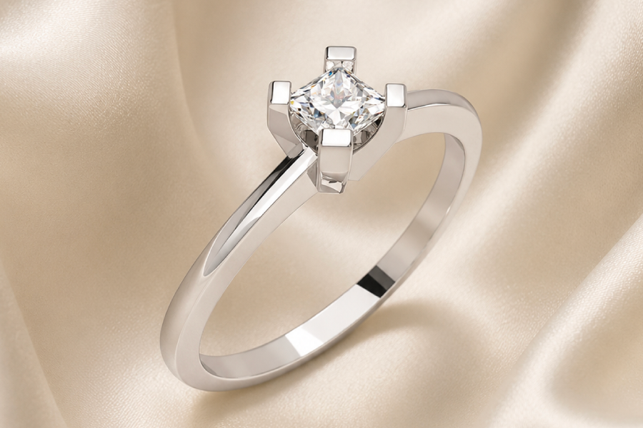 Anillo Solitario en Oro Blanco de 14 K con un Diamante de 9 Pts